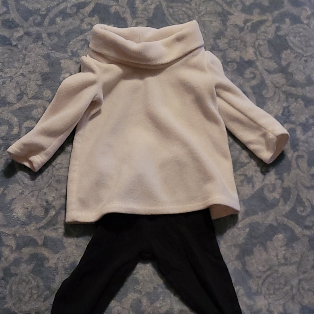 White sweater with black pants